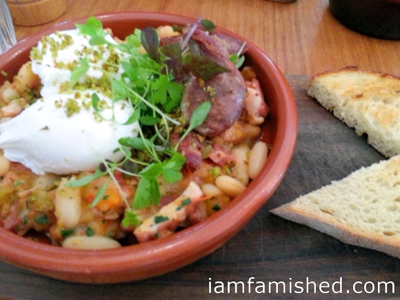 Breakfast Cassoulet (w/lstra smoked bacon + pork sausage herb crumb, poached eggs + sourdough)